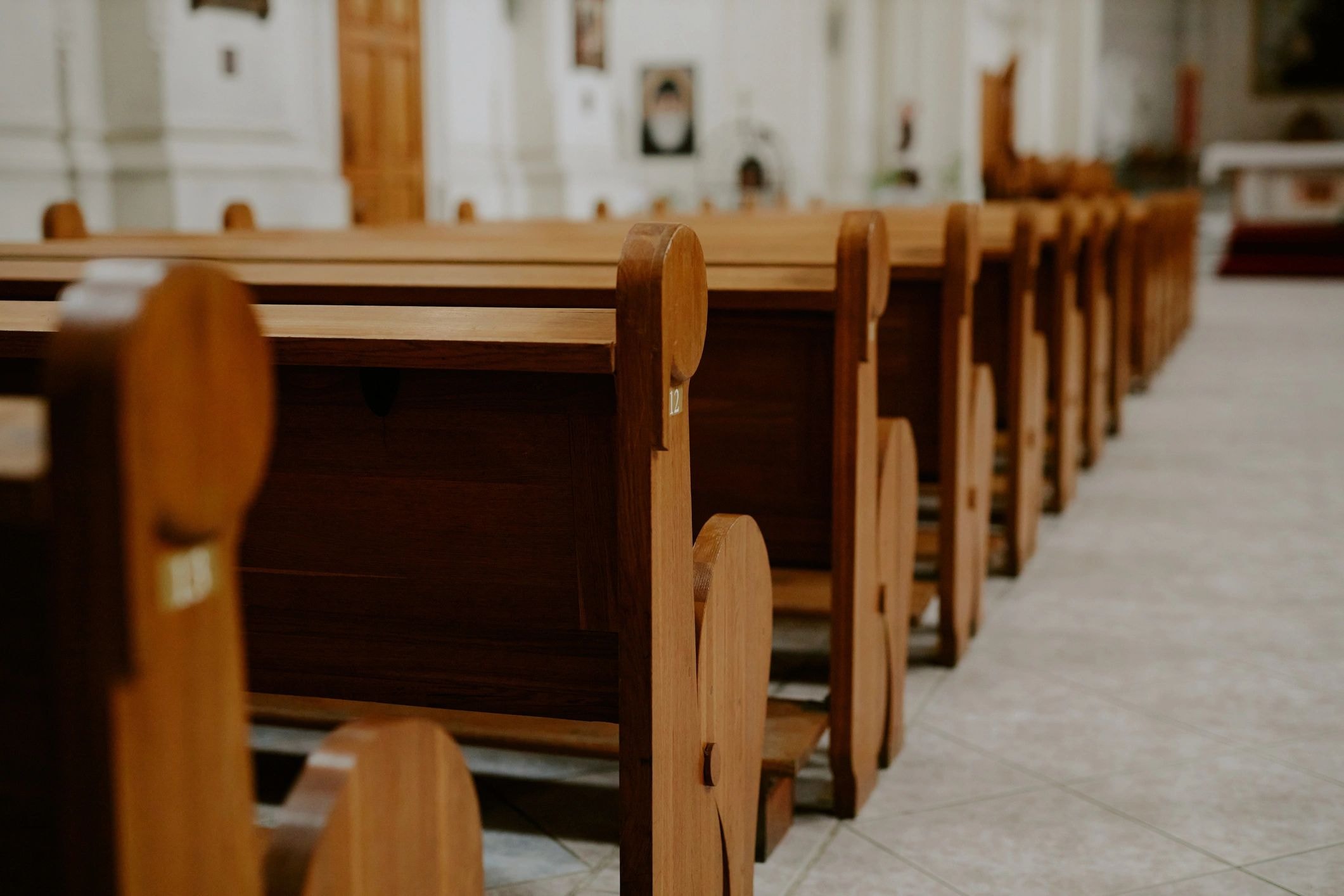 Wooden church pews in sanctuary